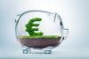 Glass piggy bank with green euro